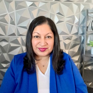 Headshot of Niketa Patel wearing a bright blue blazer